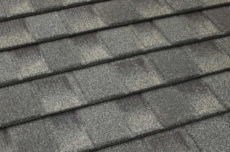 Stone coated metal roof shingle by Tilcor in color Oakwood