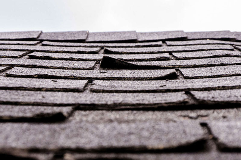 shingles messed up by the wind