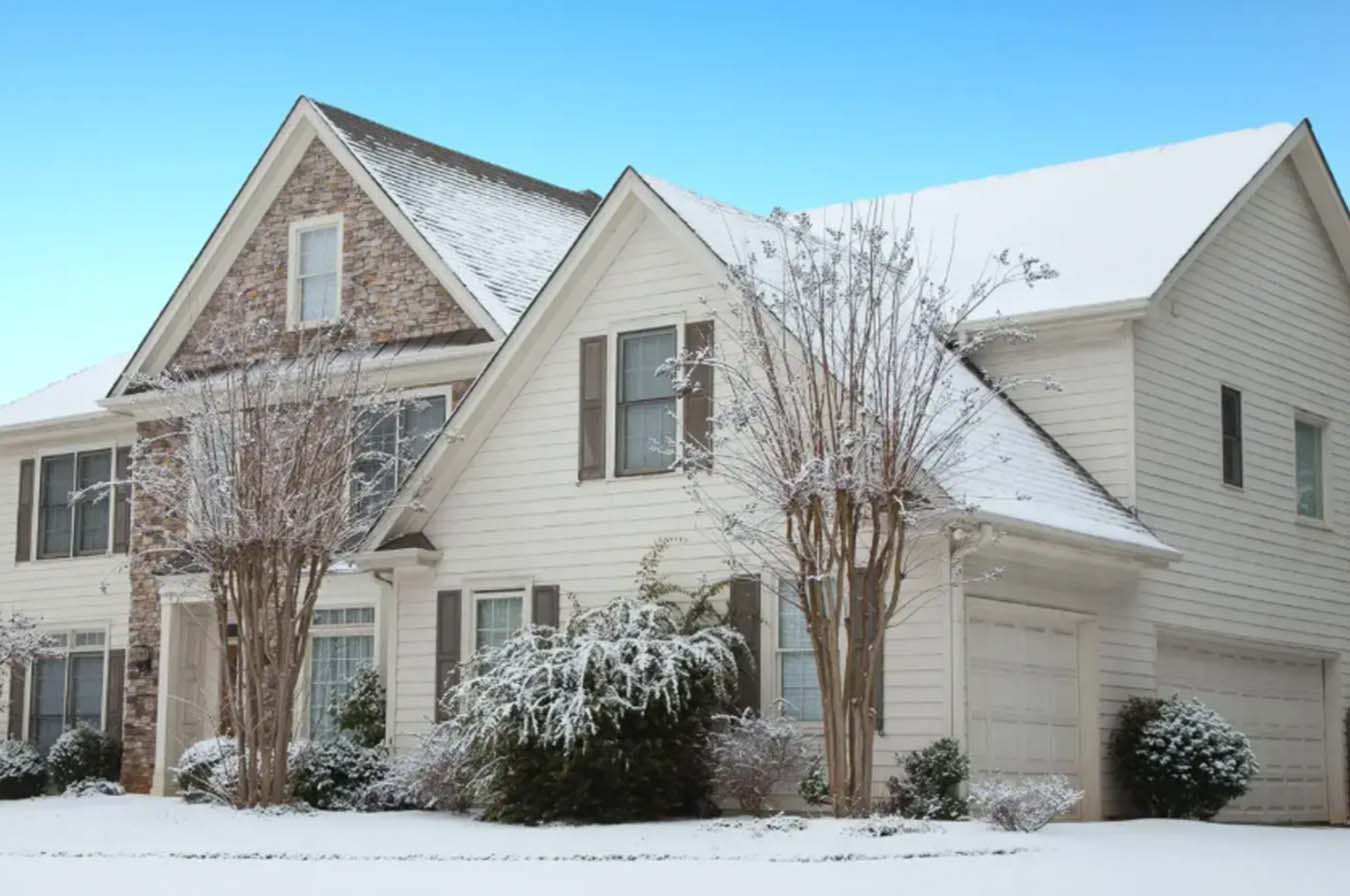 Stone coated metal roof covered in snow in Akron, Ohio