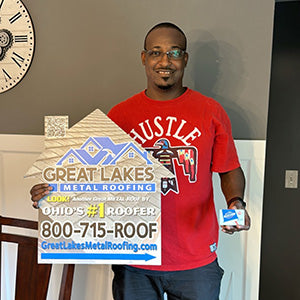 Happy customer with Great Lakes Home Remodeling sign