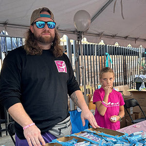 Father and daughter volunteering for Great Lakes Home Remodeling