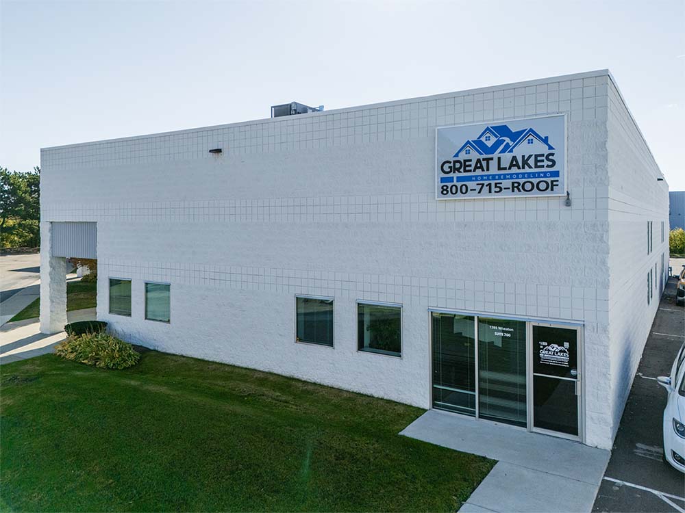 Building with 'Great Lakes' logo and contact information on a clear day