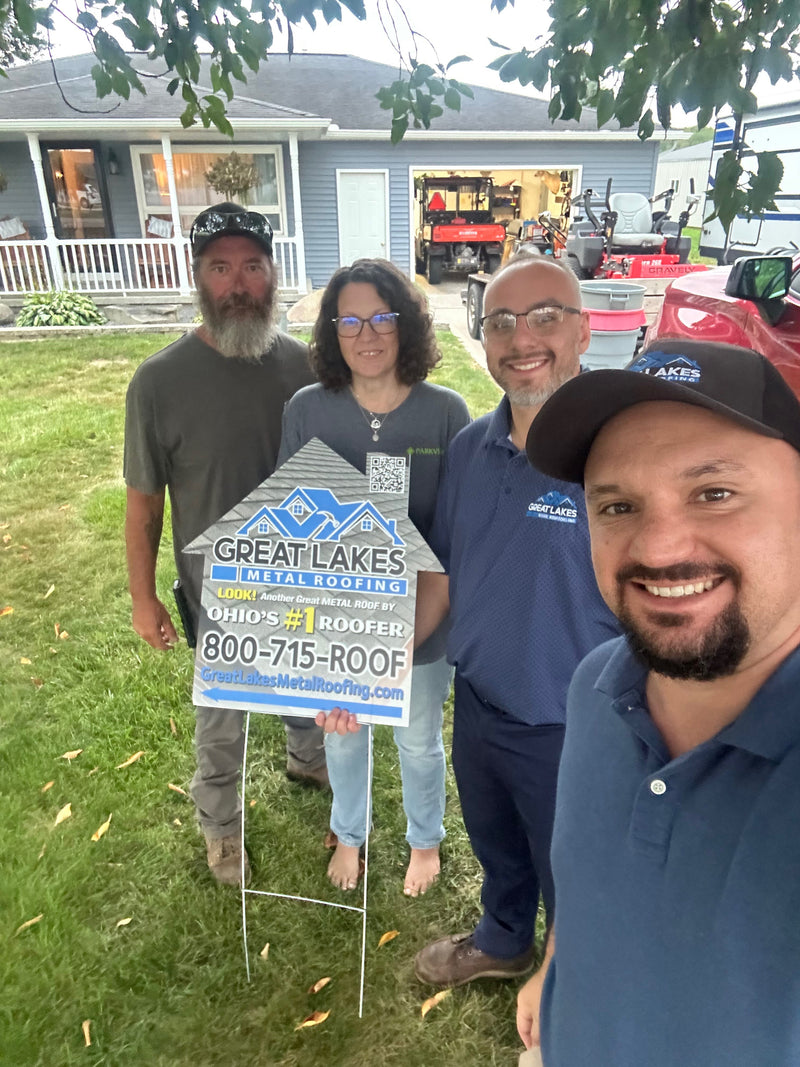 Happy customer with Great Lakes Home Remodeling sign